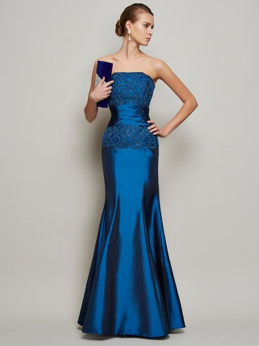 Trumpet/Mermaid Sleeveless Applique Beading Strapless Long Taffeta Dresses