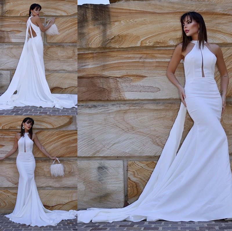 Stretch Ruffles Trumpet/Mermaid Halter Crepe Court Sleeveless Train Wedding Dresses